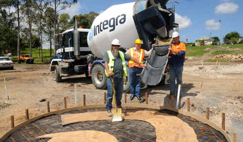 Ready set go: Concreter Mick Jardine, Cr Larry Friske and Darryl Aldn from Integra get ready to pour the first slab. Ready set go: Concreter Mick Jardine, Cr Larry Friske and Darryl Aldn from Integra get ready to pour the first slab.